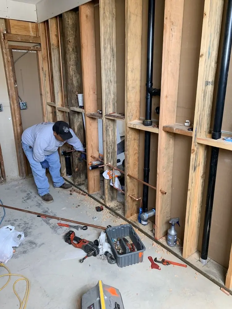 Commercial rough-in plumbing for Water Heater Replacement in East Floyd